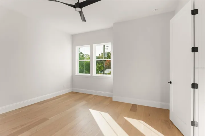 Bedroom 3 has a walk-in closet with built-in closet shelving and access to Bathroom 3.