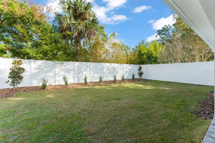 Large, fully fenced rear and side yards, has 6’ to 8’ PVC privacy fencing.