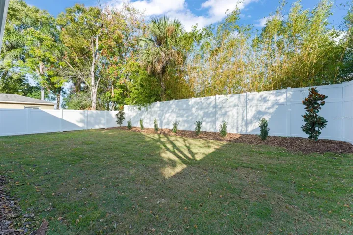 Large, fully fenced rear and side yards, has 6’ to 8’ PVC privacy fencing
