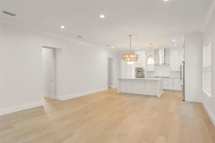 View of the dining room and kitchen.