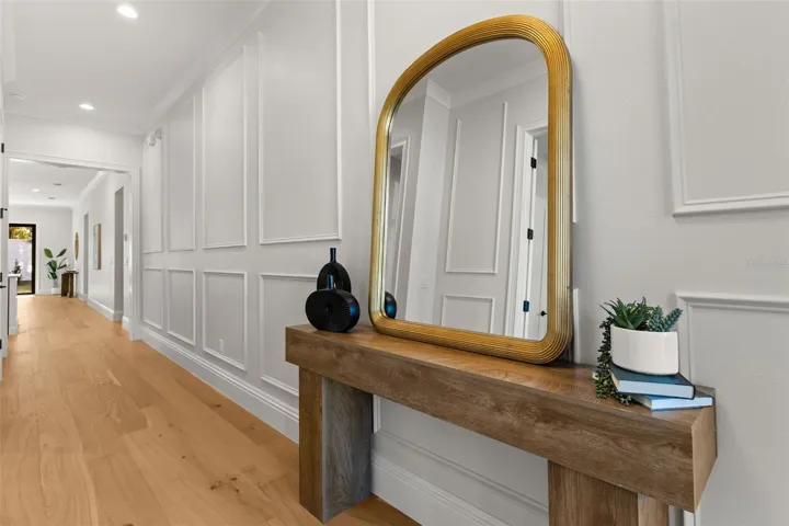 An elegant entrance welcomes all who enter this home.  The Study/Bedroom 5, is immediately off the foyer, creating a private workspace, or guest suite.
