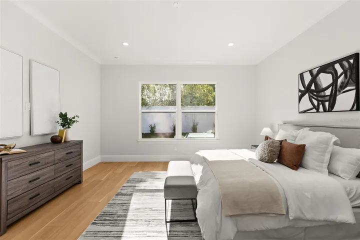 The primary bedroom has ample room for a reading area, a sitting area, an exercise area, or whatever suits your lifestyle.
