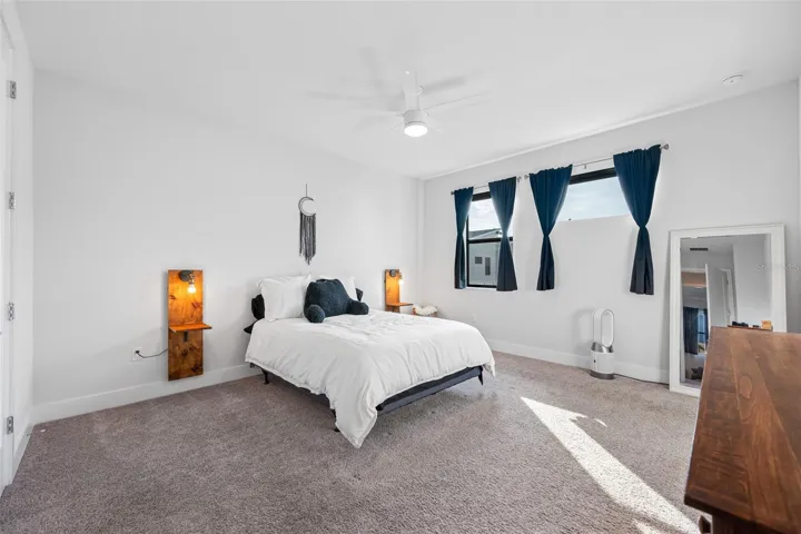 Large primary suite features 10ft ceilings, walk-in closet, ensuite bathroom with dual vanity and walk-in shower. Third Floor