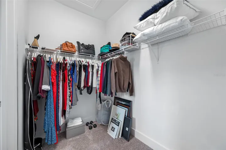 Large primary suite features 10ft ceilings, walk-in closet, ensuite bathroom with dual vanity and walk-in shower. Third Floor