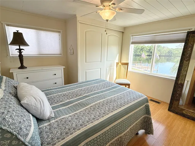 Primary bedroom with water views.