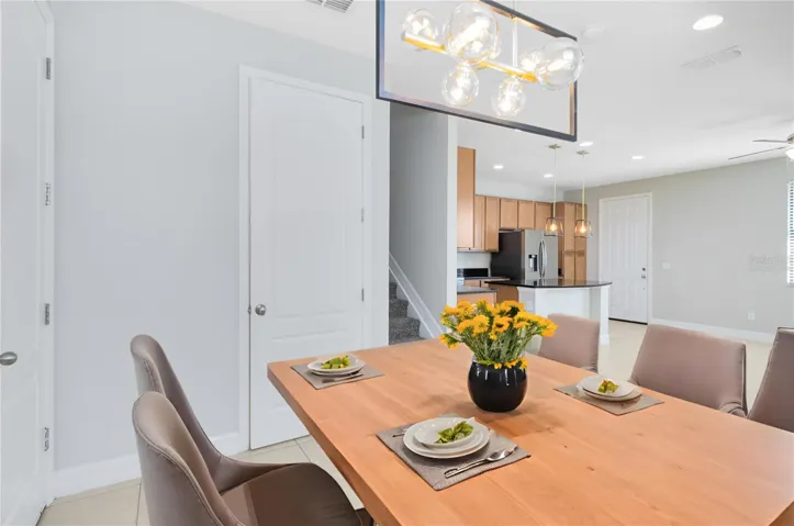 Virtually staged image. Dining.