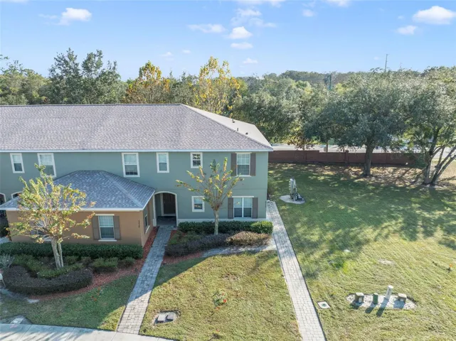 The NEW ROOF (2025) sets the tone for peace of mind in this low-maintenance 3-bedroom, 2.5-bath END UNIT townhome in Kissimmee’s Emerald Lake community!