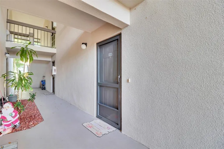 Welcome home to a quiet, well-maintained community with covered walkways and easy access to your unit—perfect for enjoying Florida living rain or shine.