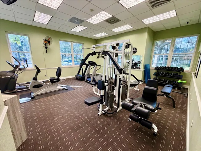 Community fitness room with cardio and weight equipment