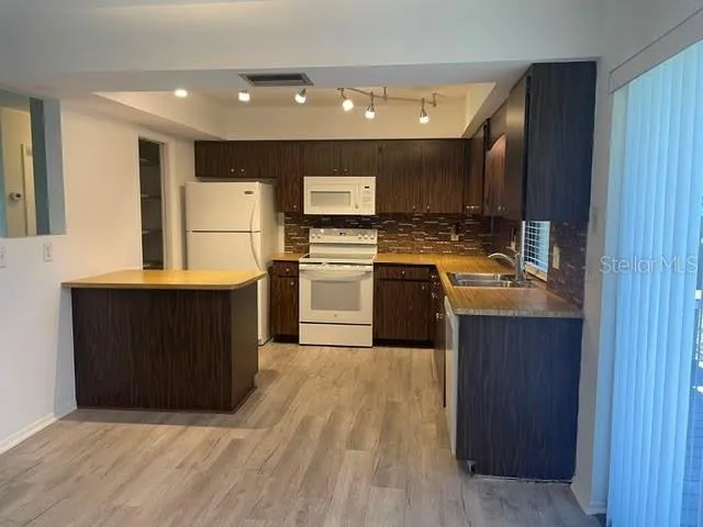 KITCHEN WITH NEWER APPLIANCES