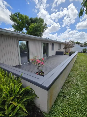 LARGE BACK DECK FACING WEST