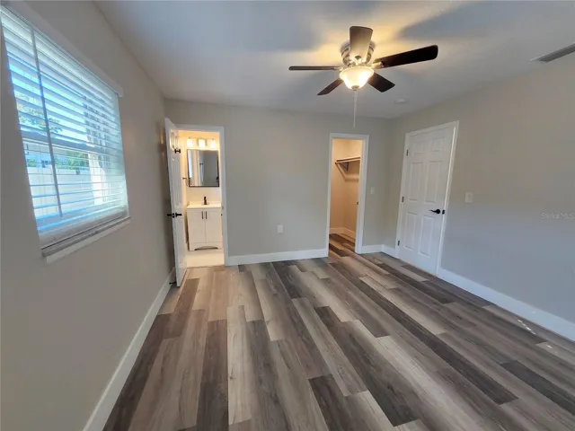Primary bedroom with ensuite bath & walk in closet