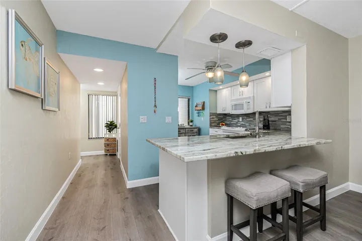 Looking Back to Entry and Into the Kitchen