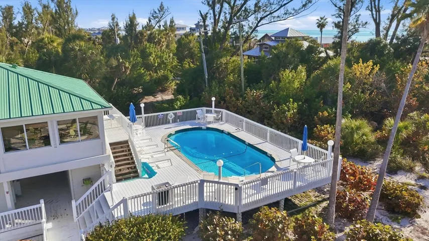 Enjoy a refreshing dip in the heated pool after a day at the beach on Little Gasparilla Island