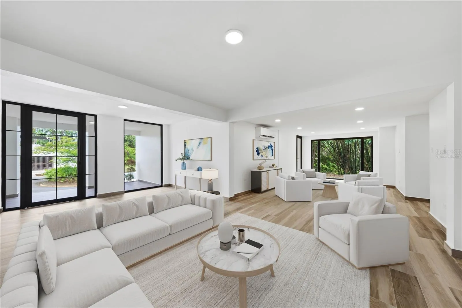 Living Area - This image has been virtually staged and does not reflect the current state of the property.
