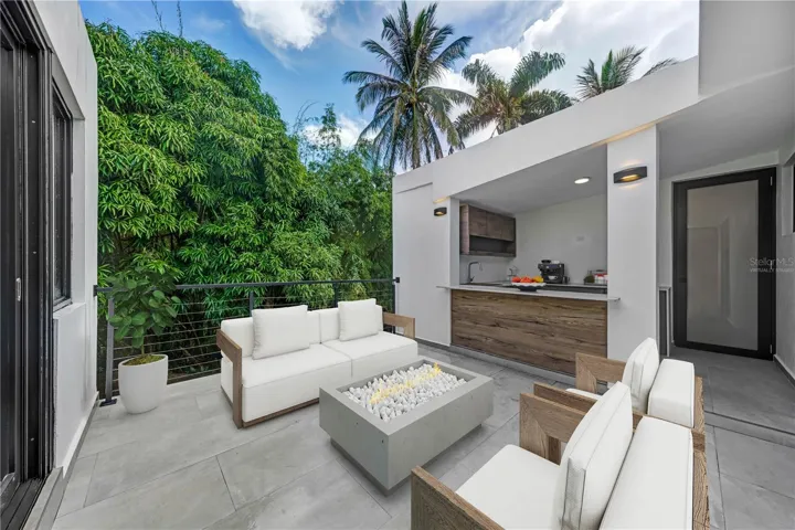 Terrace - This image has been virtually staged and does not reflect the current state of the property.