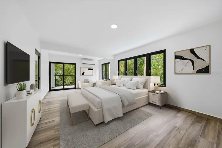 Primary Suite - This image has been virtually staged and does not reflect the current state of the property.