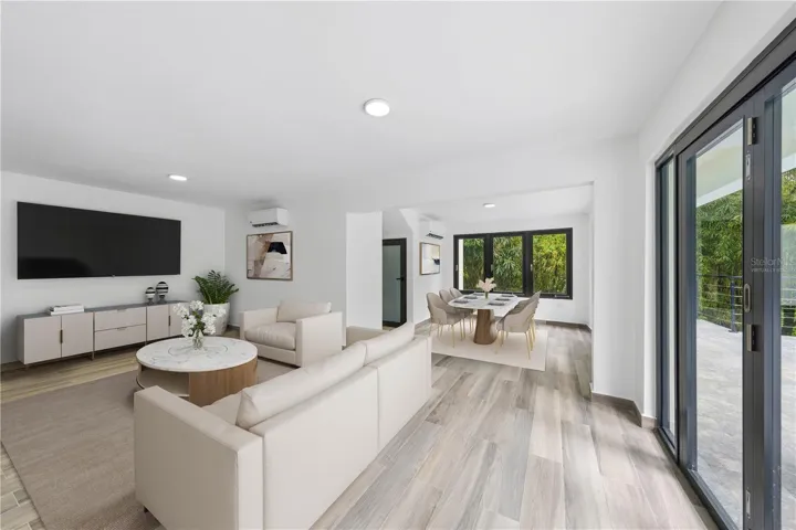 Great Room - This image has been virtually staged and does not reflect the current state of the property.