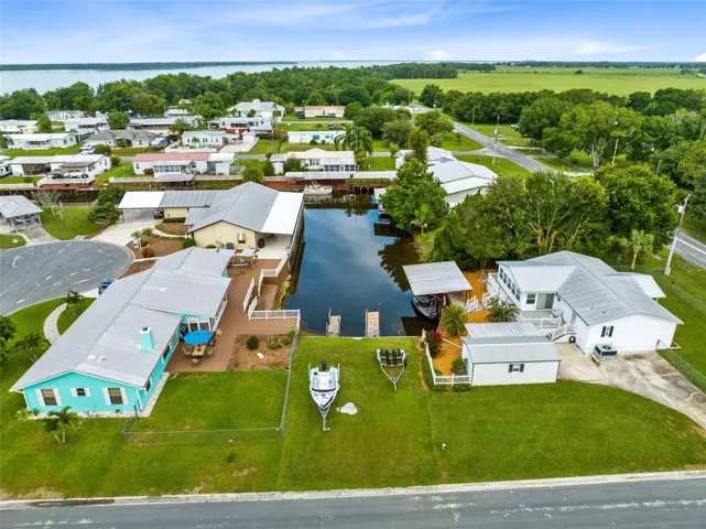 Deeded Access to this canal lot providing direct access to Lake Marian.