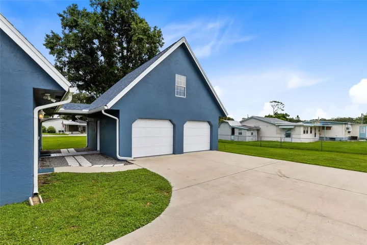 There is now a 6' white vinyl privacy fence all along the back and partial side of the property.