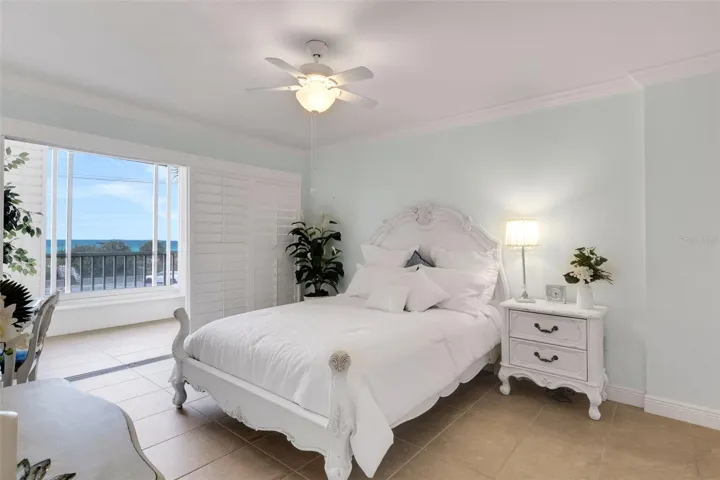 Bedroom with sliding doors lead out to the bonus room