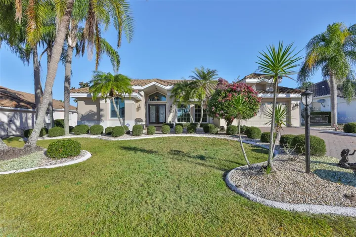 Exterior Front, Lawn Irrigation from Pond, Lovely Landscaping