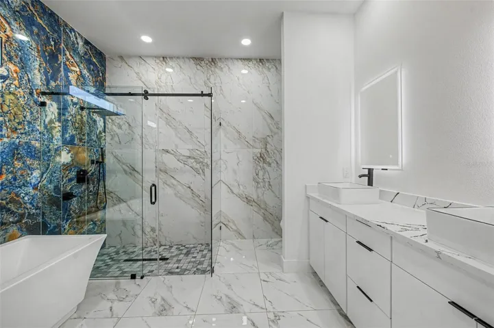 Primary Ensuite Bathroom with Floor to Ceiling Tile