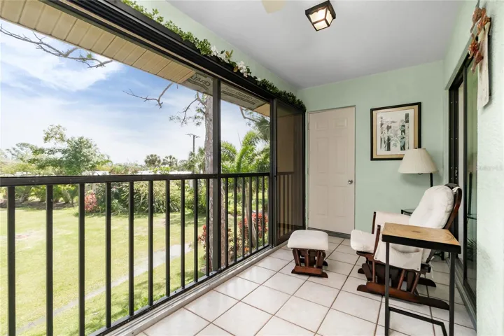 The Florida room is glass enclosed, thus making it usable and comfortable in all kinds of weather!
