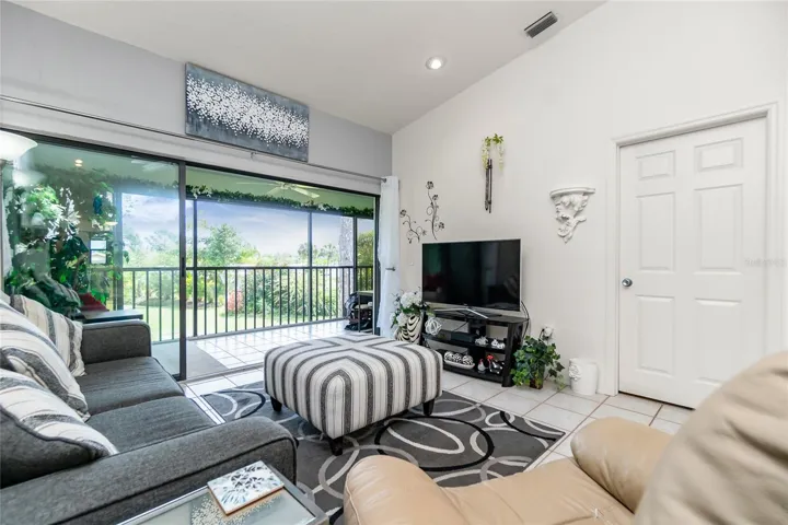 Sliding glass doors open on to the Florida room