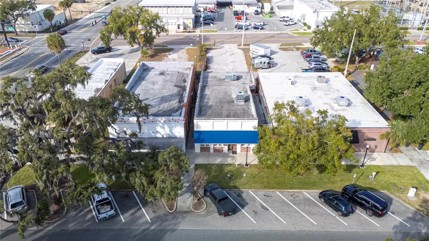 The front of the building in on Davidson St and the rear is on Church Street,  aerial view of the property from front to back...parking in the front and rear of the building