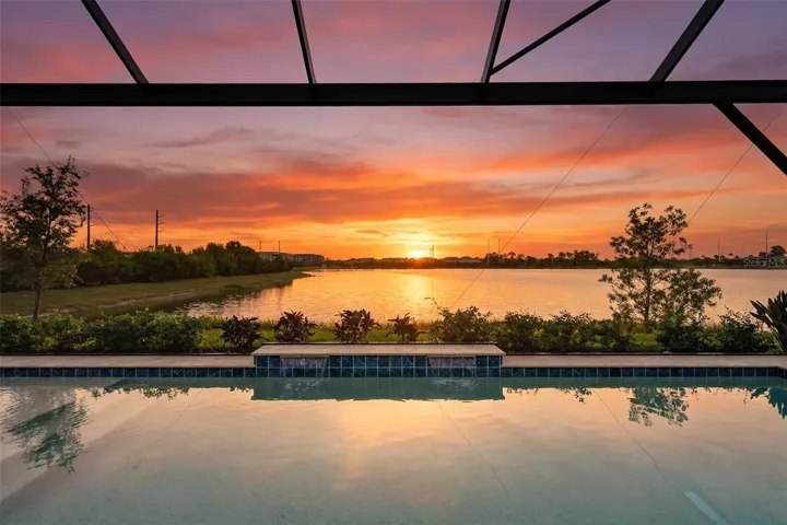 Evenings feel magical from the lanai, where the water reflects each breathtaking sunset over the lake—your own resort backdrop at home.