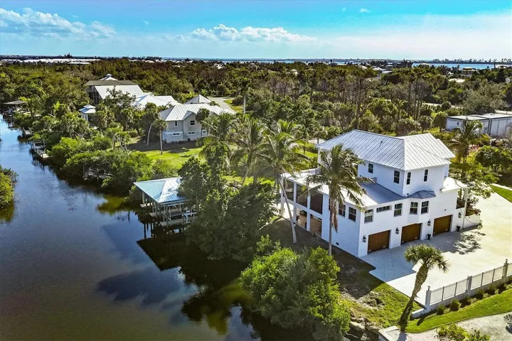 4 Bed 3 1/2 Bath on Amberjack Creek with Pool and 2 Lifts!