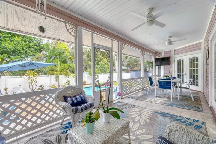 Covered rear porch with ceiling fans