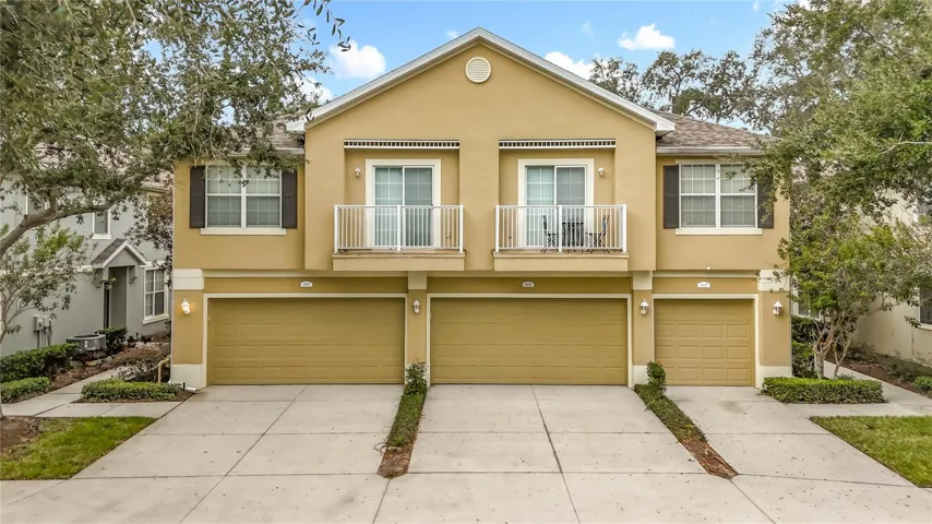 End unit with 2 car garage and entrance are on the left.