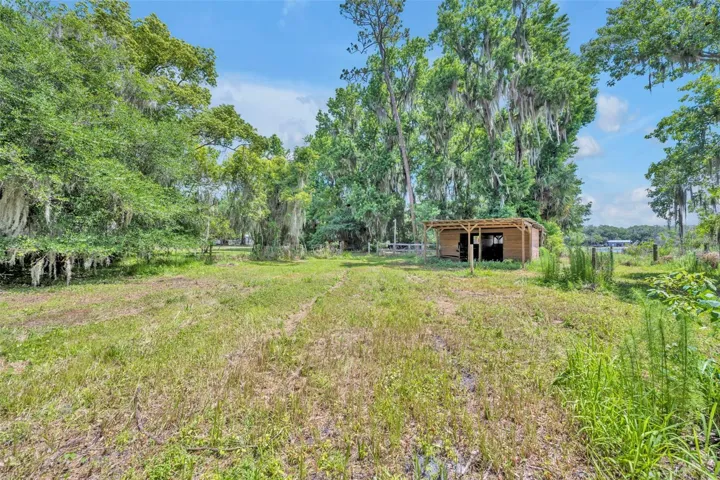 Wake up to peaceful Tyler Lake views and the privacy of your own 1.56-acre retreat.