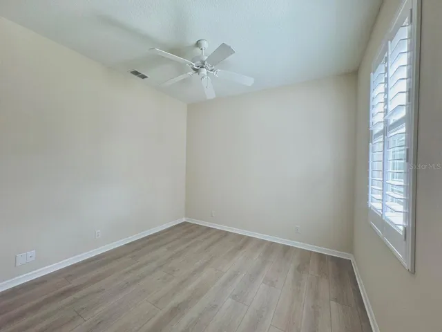 Guest Bedroom with Plantation Shutters