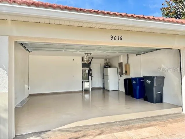 Spacious 2 car garage; pull down attic stairs