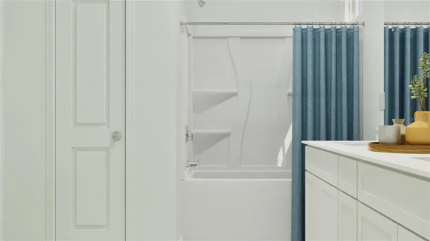 Virtually staged. Main bathroom suite