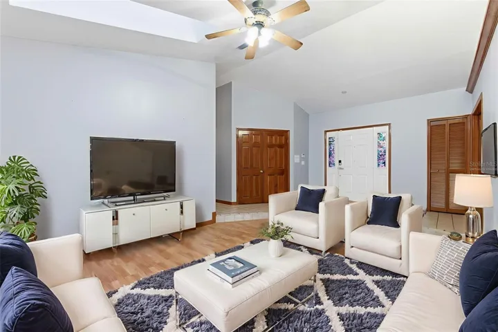 Living Room Reverse Virtually Staged looking back at front entry
