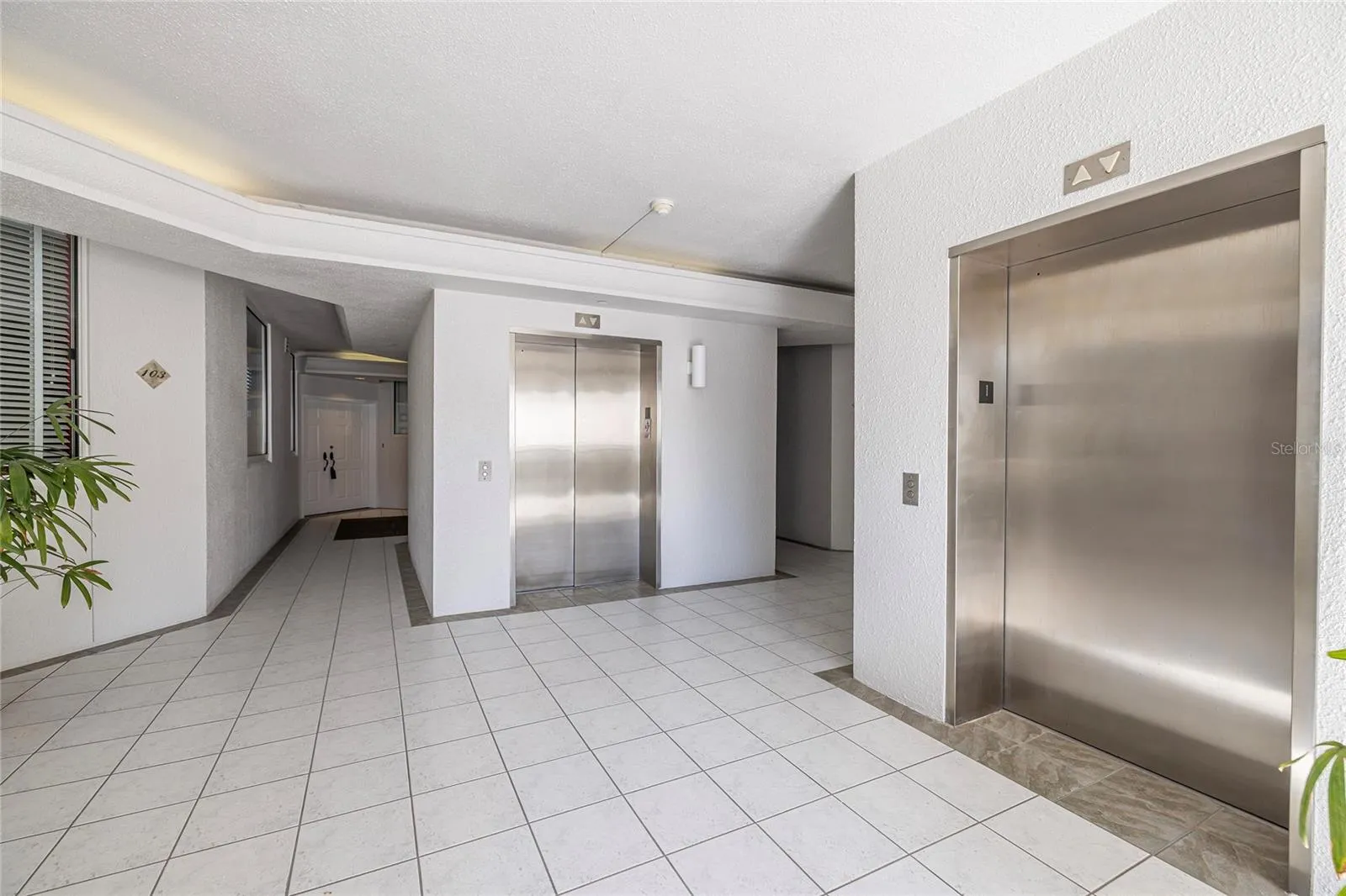 Elevators, unit 103 on left