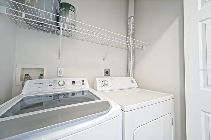 Inside full size washer and dryer (dryer has been replaced since photo)