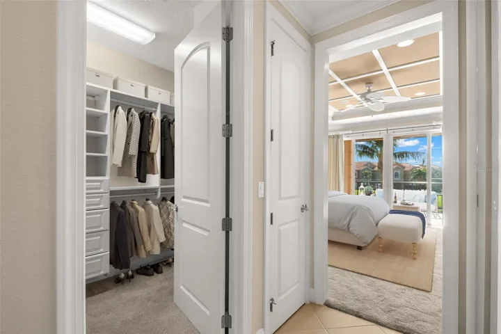 Virtually staged; approaching Main Bedroom.