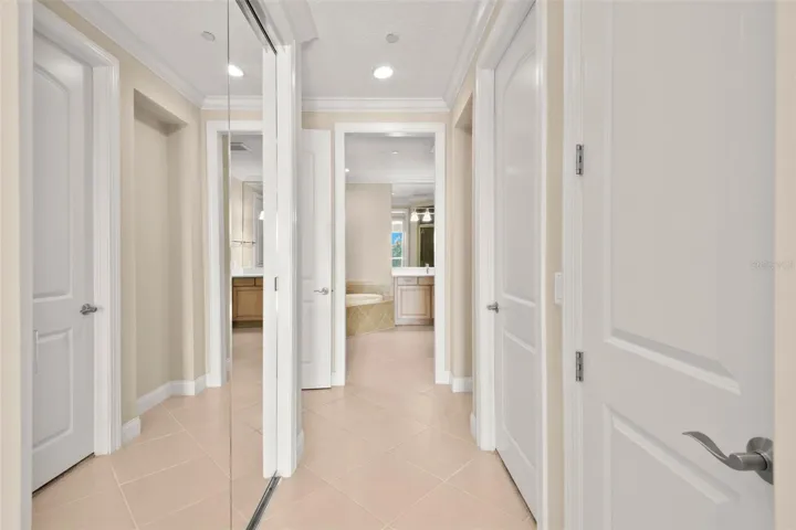 Walking from Main Bedroom to Owner's Bath.