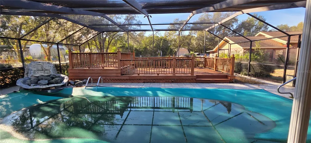 Screened Pool Lanai with wood deck