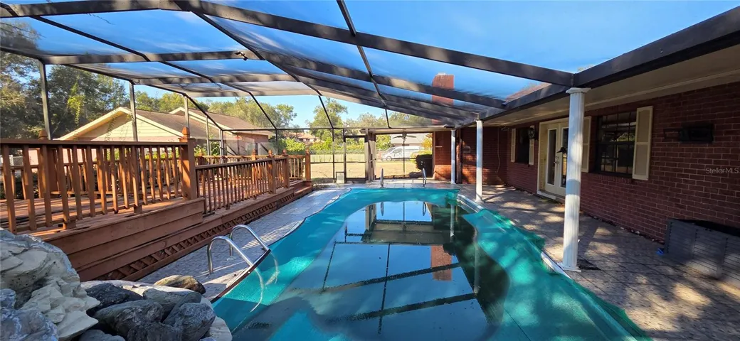 Screened Pool Lanai with wood deck