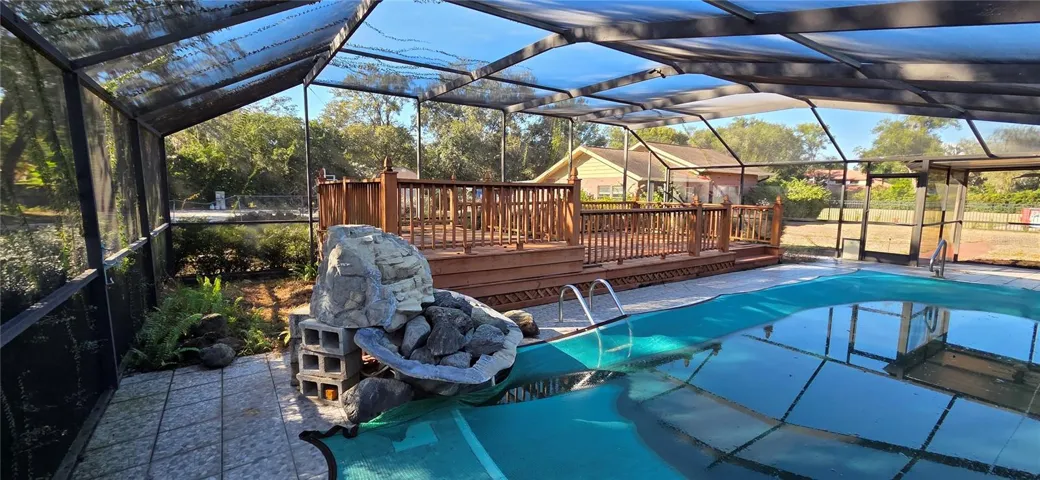 Screened Pool Lanai with wood deck