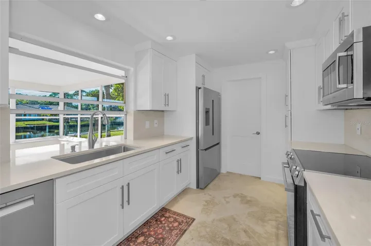 Kitchen with pass-thru to Florida Room