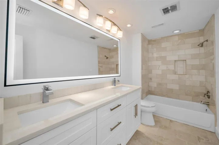 2nd bathroom with double sink vanity