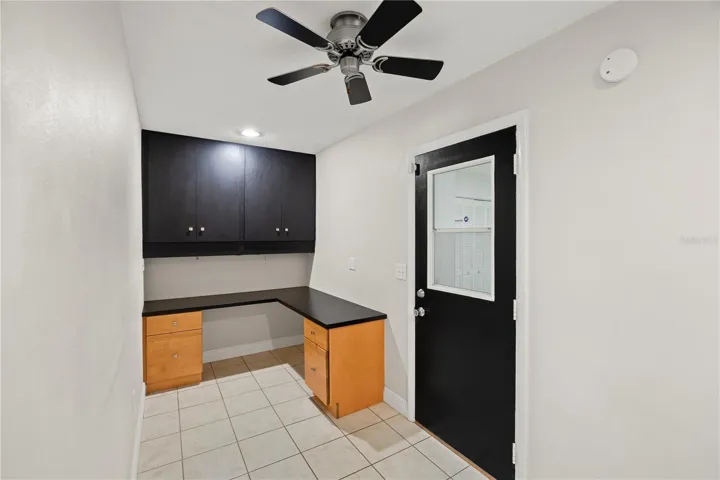 Custom cabinets and desk in the study (located between kitchen & garage)