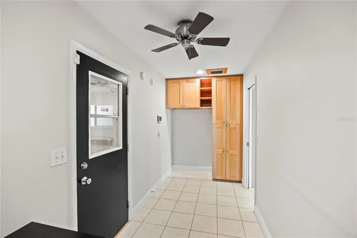Custom cabinets and desk in the study (located between kitchen & garage)